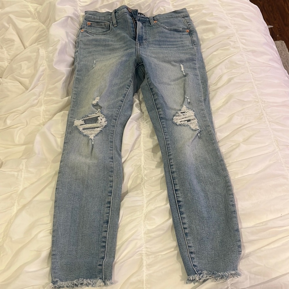 Blue ripped skinny jeans